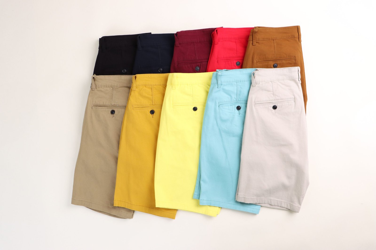 pexels photo 30710089 30710089 Flat lay of colorful men's shorts in different styles and colors, ideal for summer fashion.